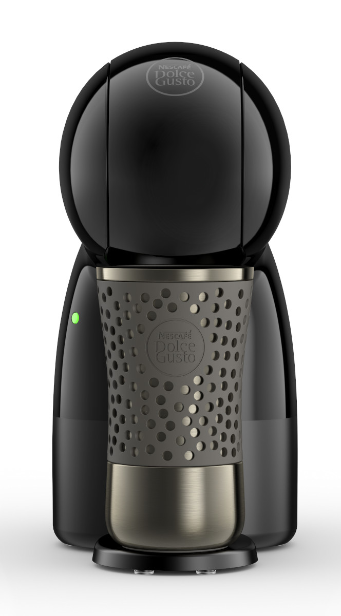 Machine à café Dolce Gusto noire avec un porte-tasse. La lumière verte est allumée.