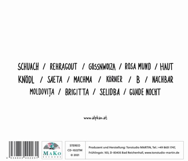 Die Hand einer Person hält ein Telefon vor einer Ladestation mit anderen Geräten.
