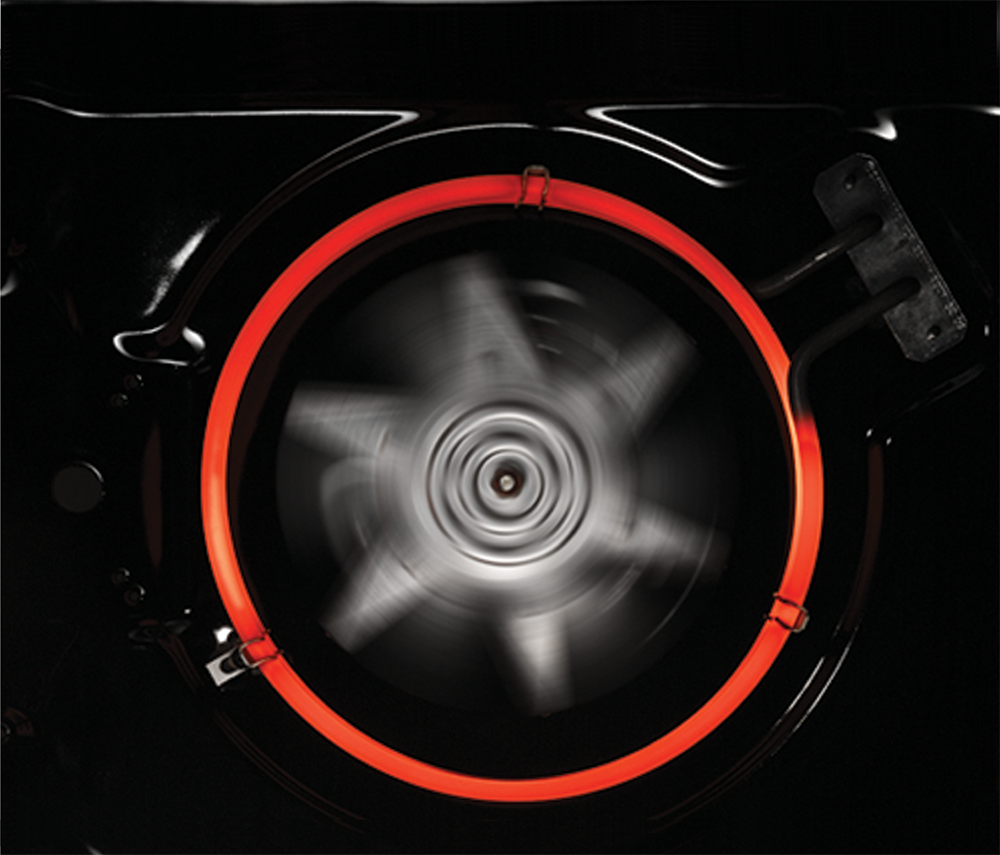 Inside an oven, a glowing red heating element and a spinning fan are visible.