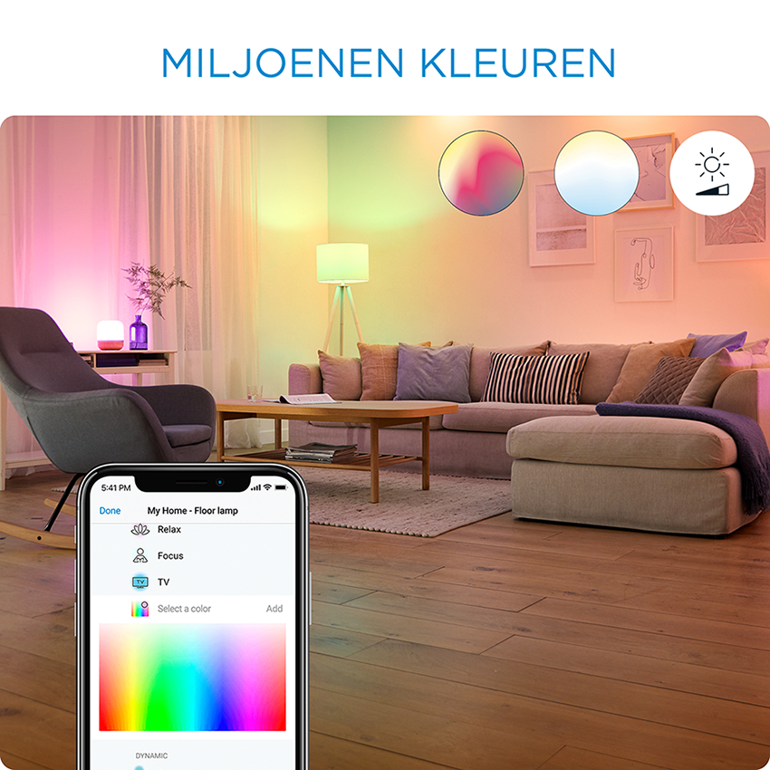 Living room scene with smart lights controlled by a phone.