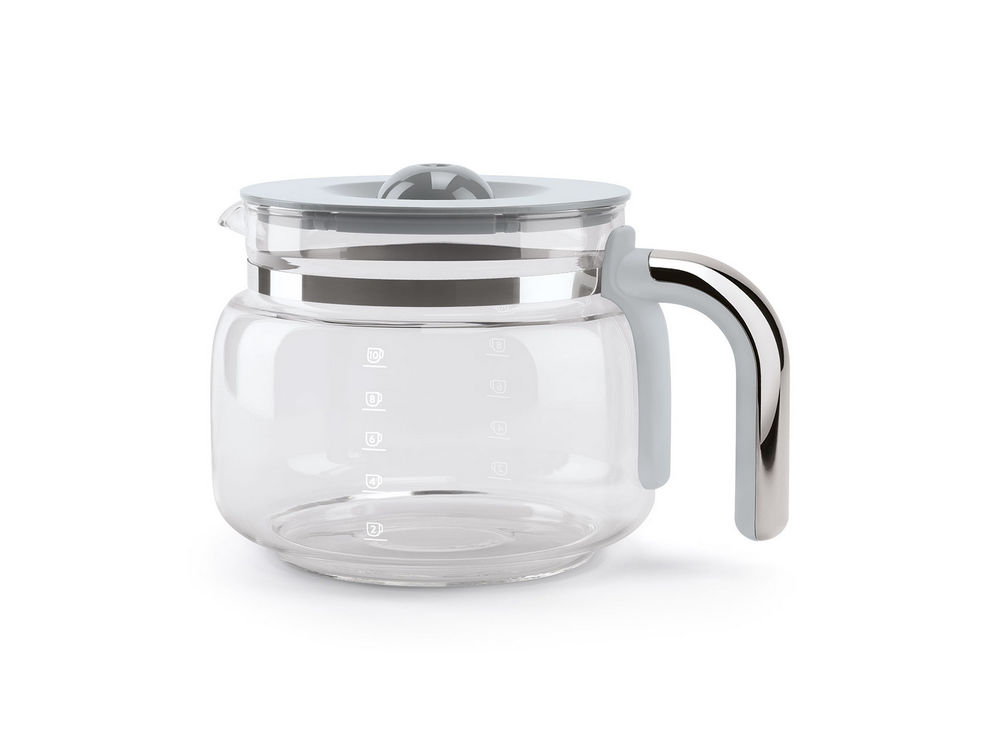 Una cafetera de vidrio transparente con tapa y asa grises.