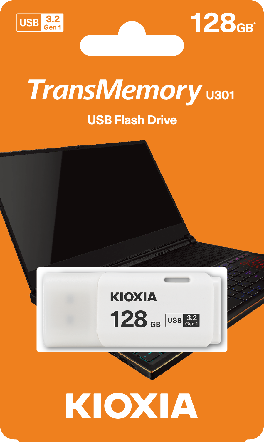 Ambalajında bir KIOXIA 128GB USB flash sürücü, arka planda bir dizüstü bilgisayar.