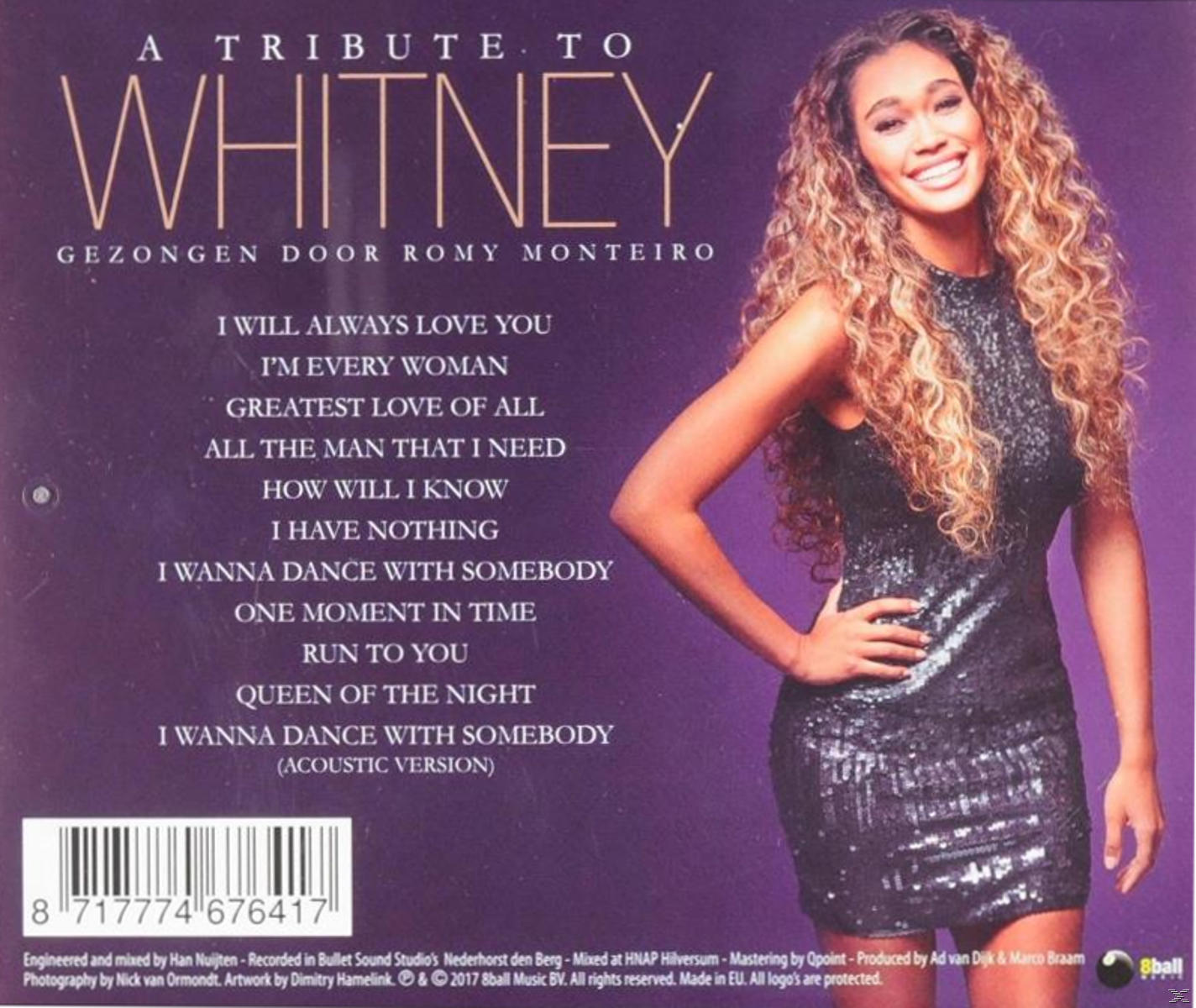 Albumhoes. Een vrouw met krullend haar in een sprankelende jurk glimlacht. Tekst zegt 'Whitney' en songtitels.