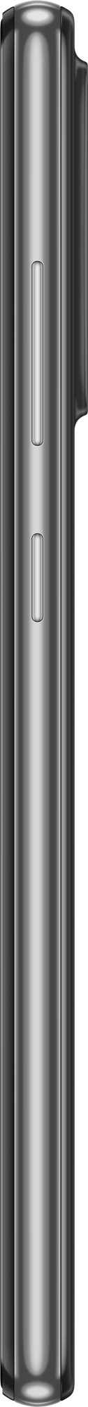 Zijaanzicht van een zilveren smartphone, met de aan/uit- en volumeknoppen, tegen een zwarte achtergrond.