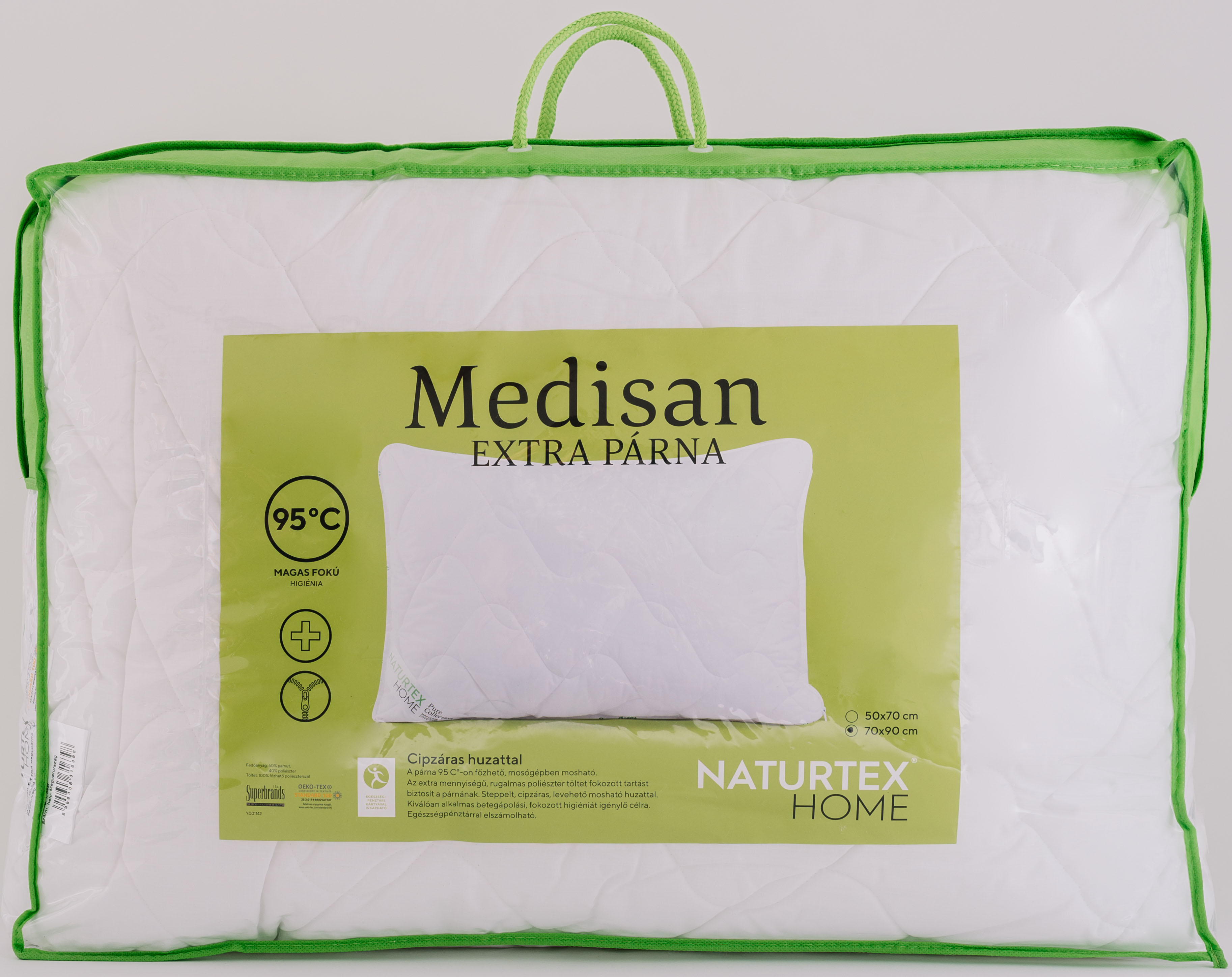 Párna műanyag zacskóban zöld szegéllyel. Szöveg: 'Medisan EXTRA PÁRNA' és 'NATURTEX HOME'.