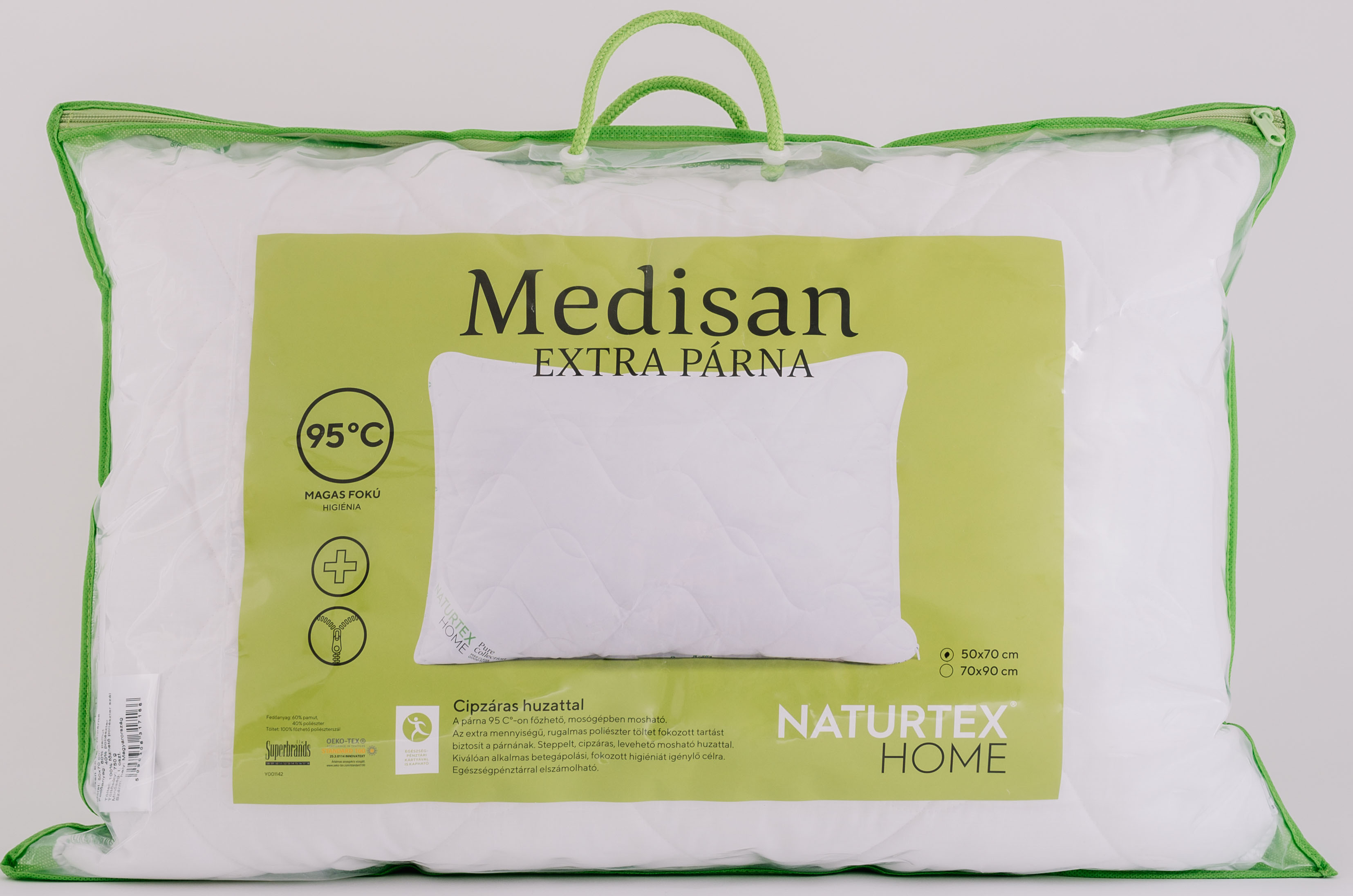 Egy párna egy műanyag zacskóban. A szöveg magyarul van, és ez áll: 'Medisan EXTRA PÁRNA'.