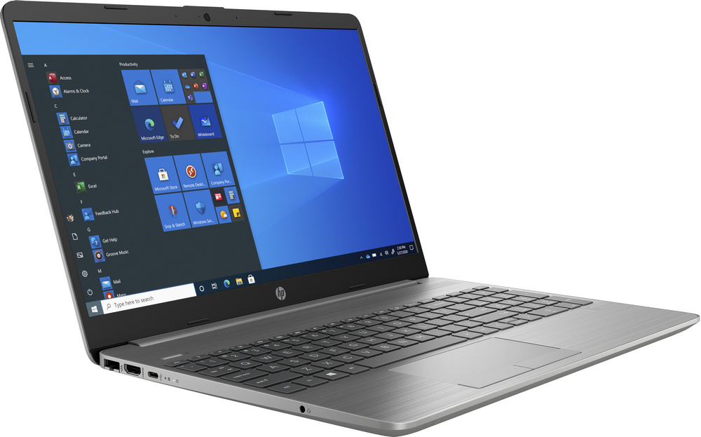 Un portátil plateado con teclado negro, que muestra el escritorio de Windows con varios iconos de aplicaciones.