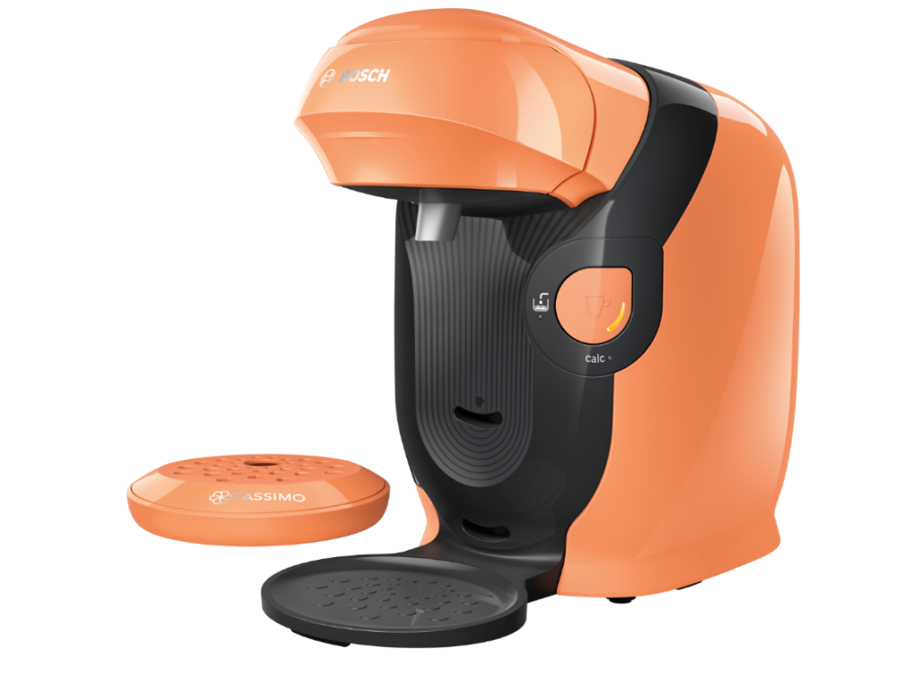 Cafetera naranja y negra con bandeja naranja extraíble.