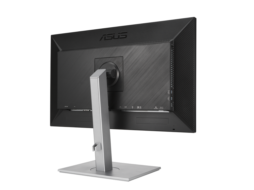 Parte trasera de monitor de ordenador negro con logo ASUS, soporte y varios puertos abajo.