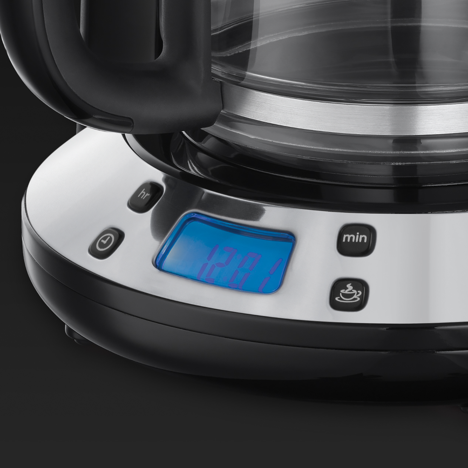 Close-up of a black coffee maker's control panel with a blue display showing 12:01.