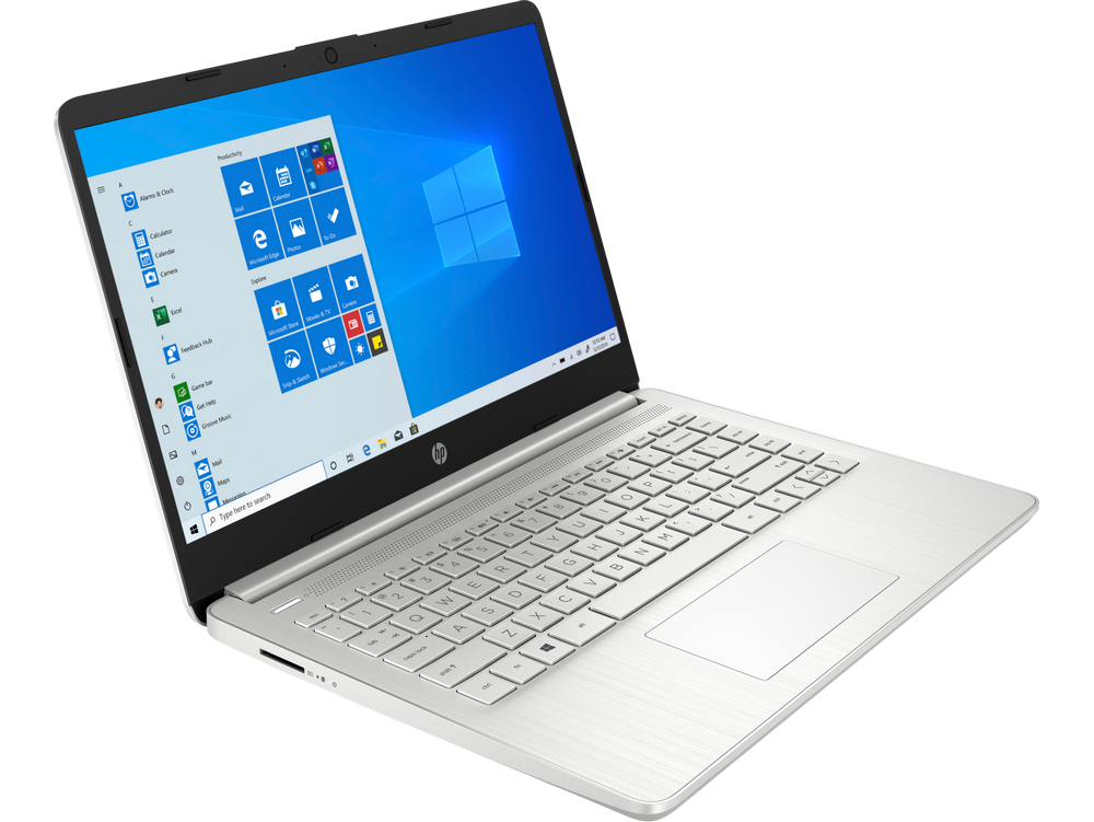 Portátil plateado con interfaz Windows. Abierto, sobre superficie blanca.