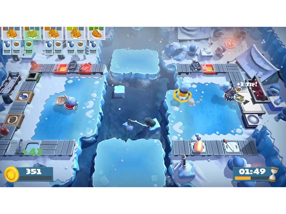 Escena del videojuego Overcooked. Chefs en la nieve, preparando comida en plataformas de hielo.