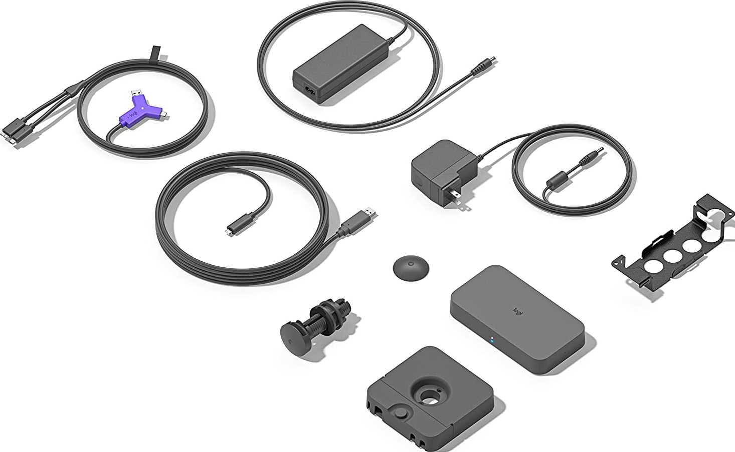 Assortimento di accessori tecnologici: cavi, caricabatterie e altri piccoli dispositivi.