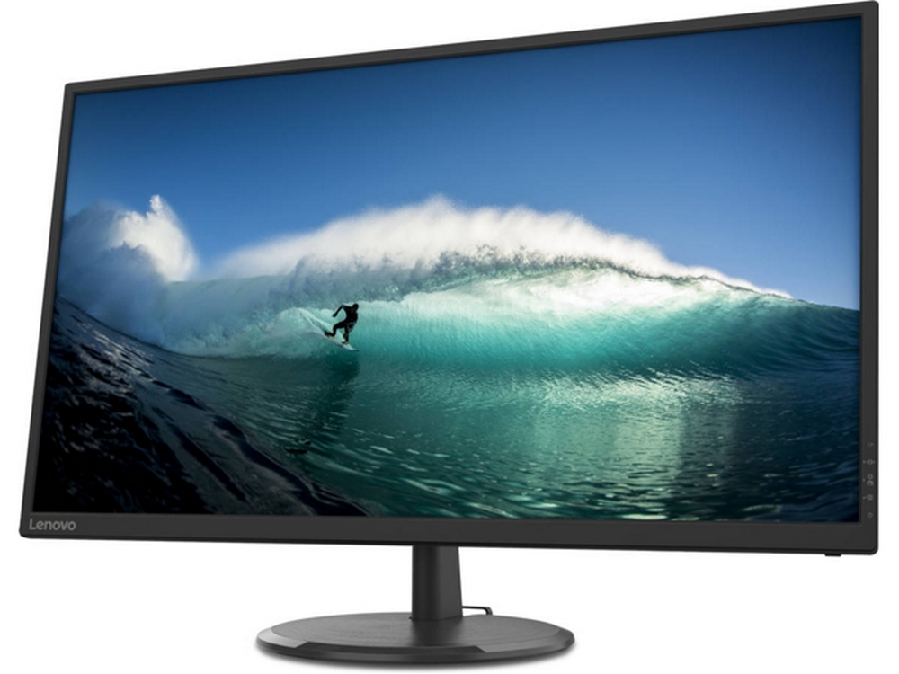 Un monitor de computadora que muestra a un surfista montando una ola bajo un cielo azul.