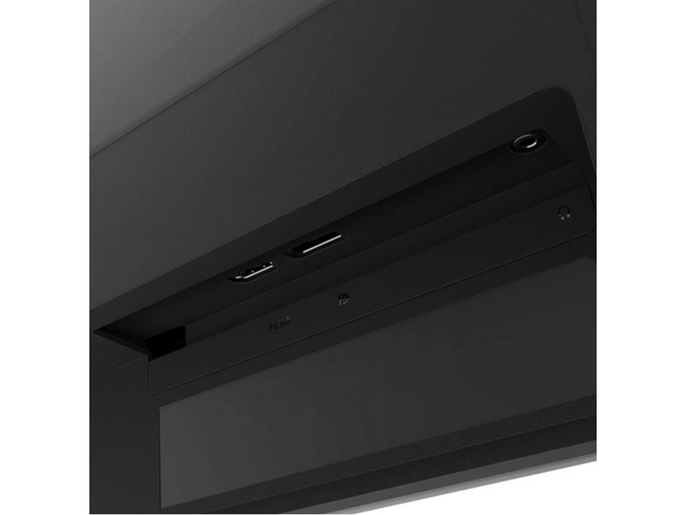 La parte trasera de un monitor que muestra puertos HDMI y auriculares, y otras ranuras de conexión.