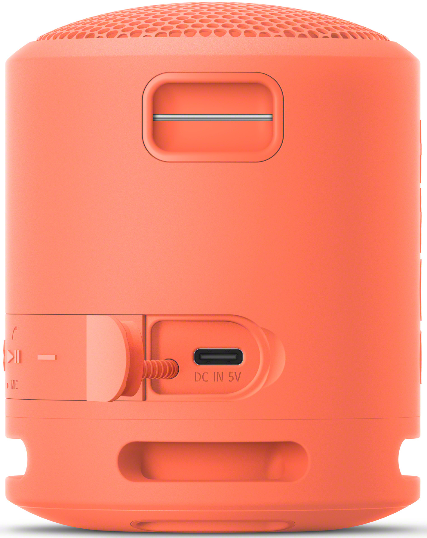 Altoparlante portatile arancione con pulsanti e una porta di ricarica.