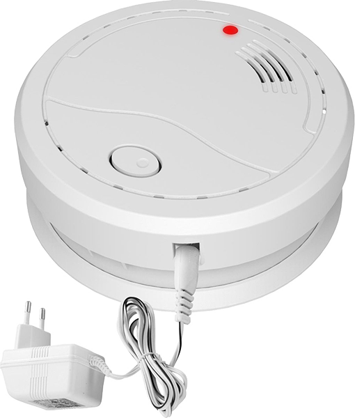 Witte rookmelder met een rood lampje en voedingsadapter. De rookmelder is rond.