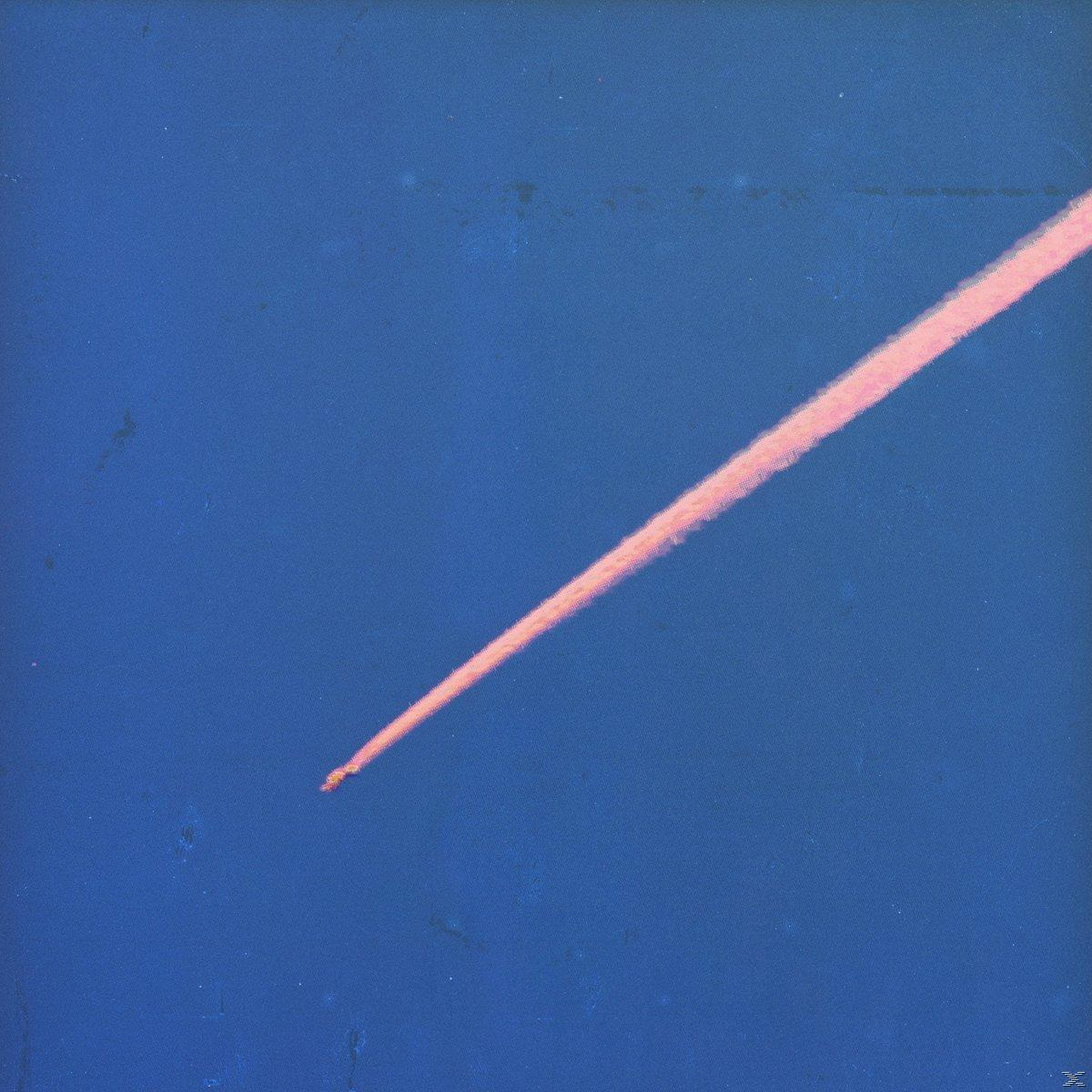 Eine rosa Kondensstreifen in einem klaren blauen Himmel.