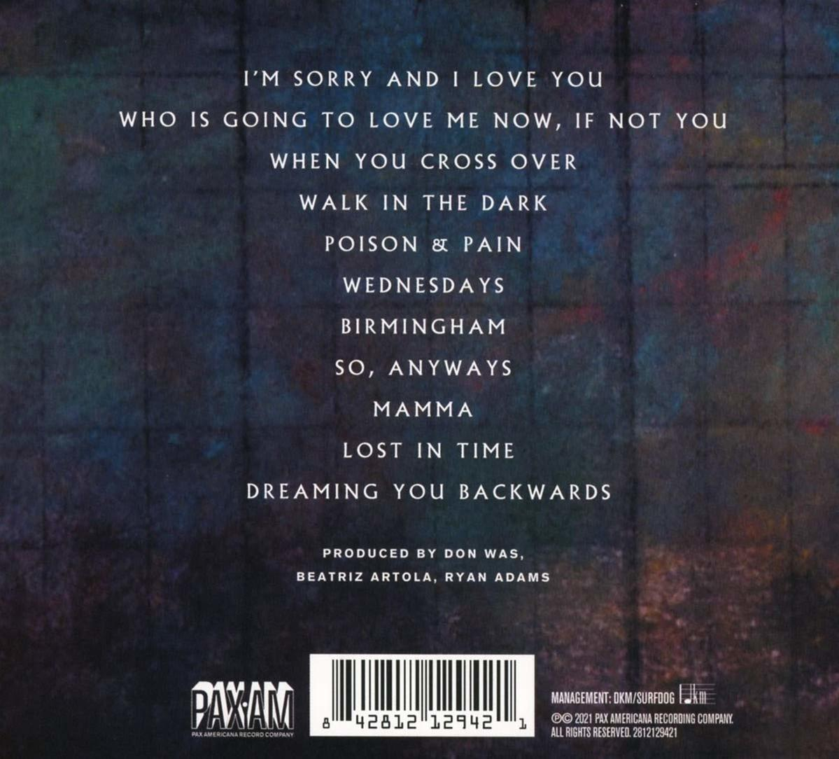 Achterkant van een album met songtitels en credits. De achtergrond is donker en heeft een patroon.