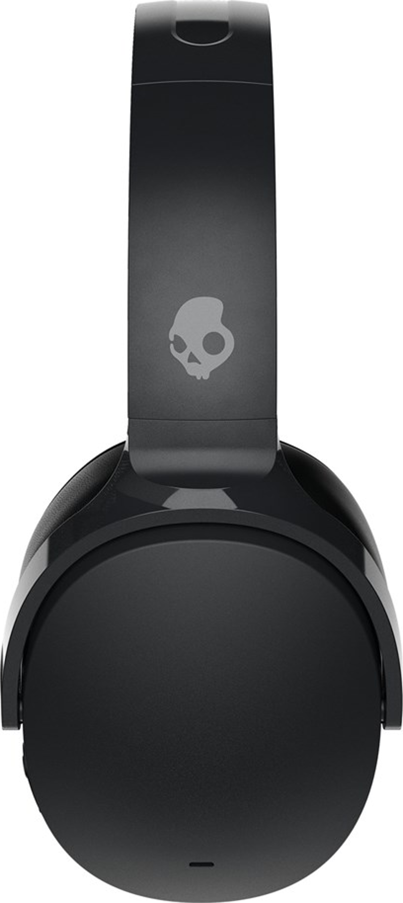 Cuffie Skullcandy nere. La fascia ha il logo di un teschio. I padiglioni sono grandi, rotondi e neri. Design elegante e moderno.