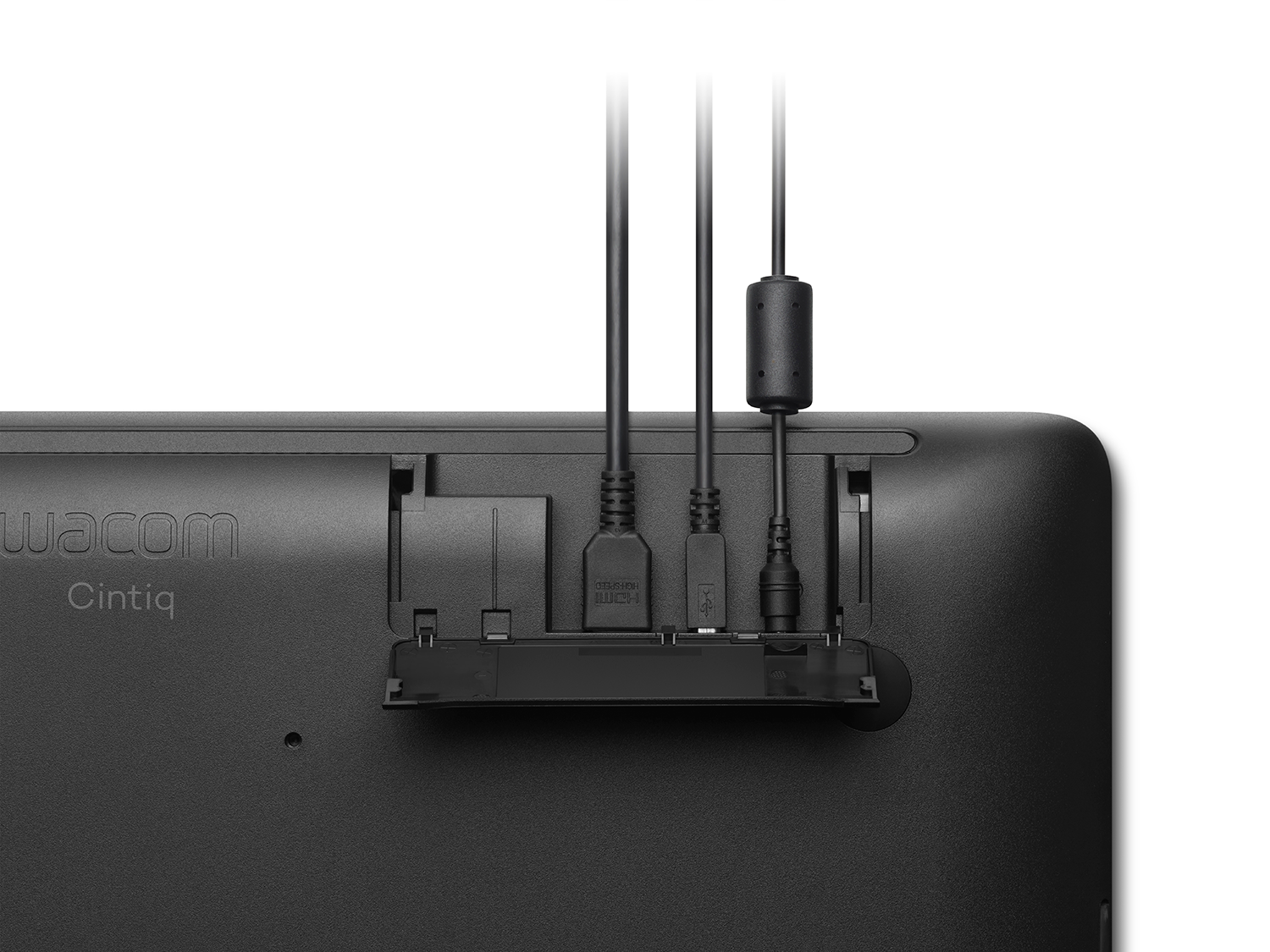 A Wacom Cintiq tablet with cables plugged into the back. A black design.