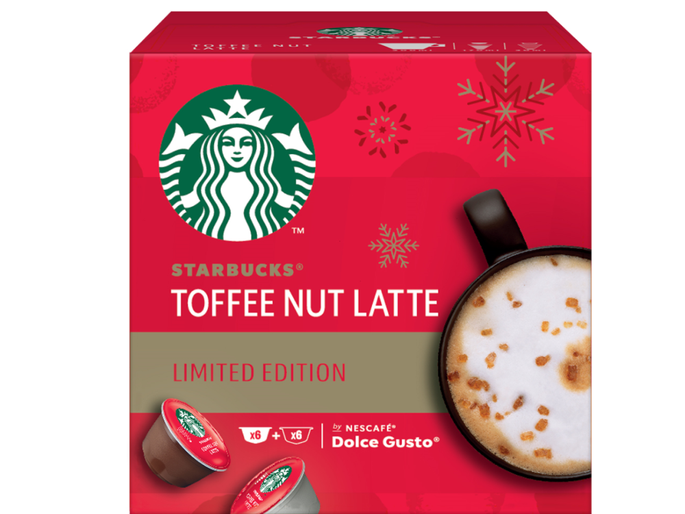 Caja de Starbucks Toffee Nut Latte. La caja es roja con adornos de copos de nieve blancos.