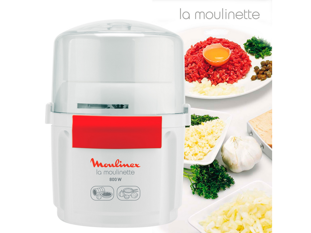 Un procesador de alimentos Moulinex blanco con ingredientes alimenticios mostrados alrededor.
