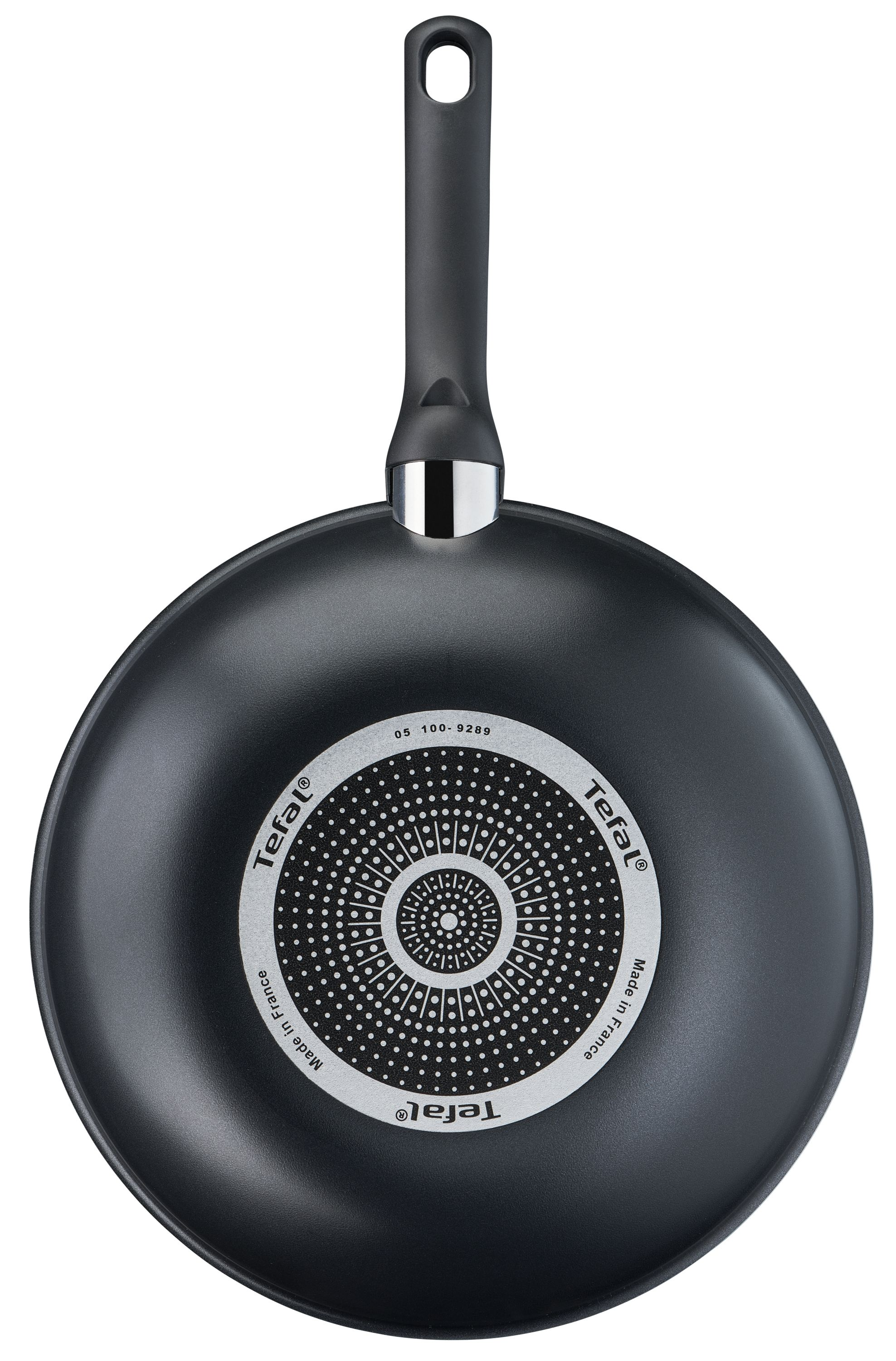 Schwarze Bratpfanne, Unterseite, mit Tefal-Logo und konzentrischem Muster.