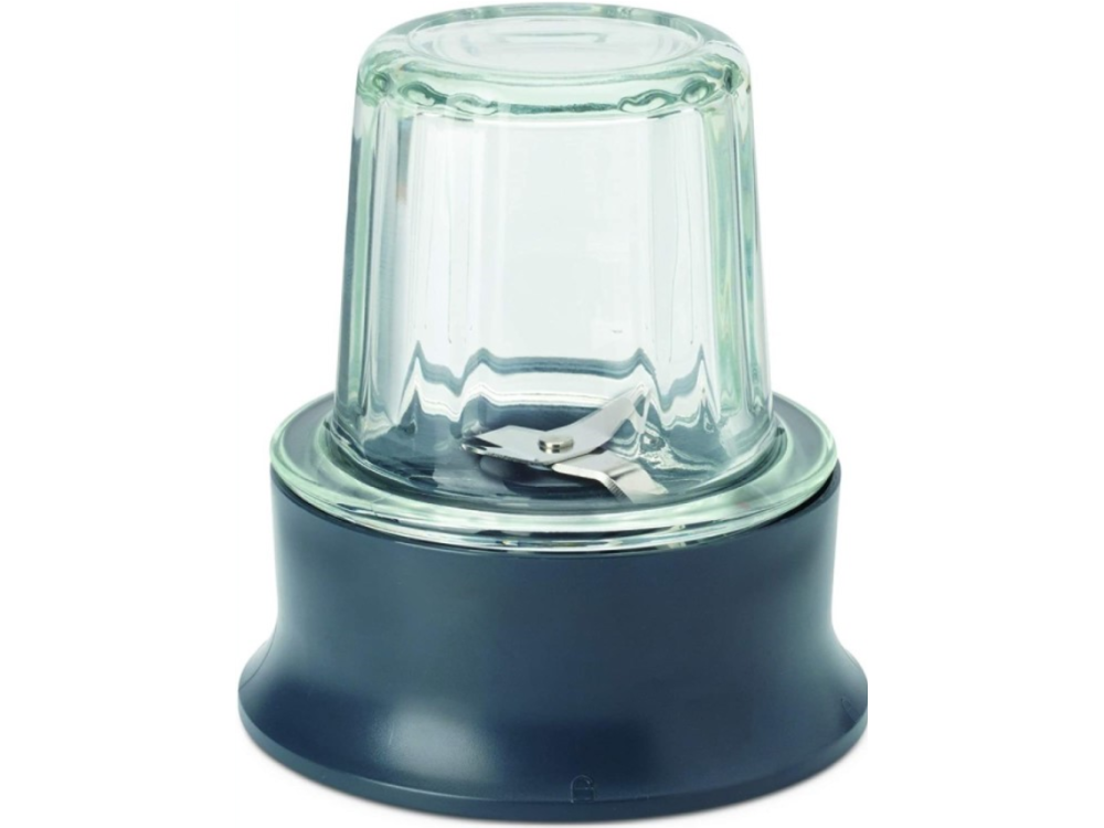 Una taza de licuadora de vidrio transparente con una cuchilla y base oscura.