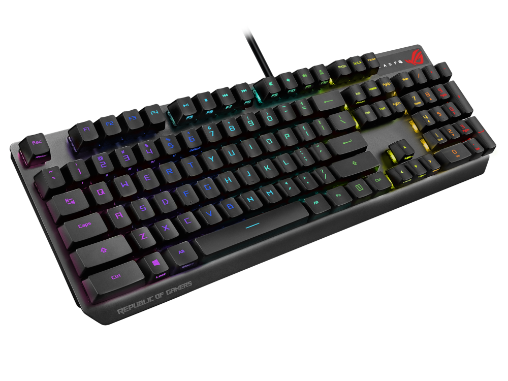 Teclado retroiluminado RGB con teclas negras, logo ROG en superficie negra.