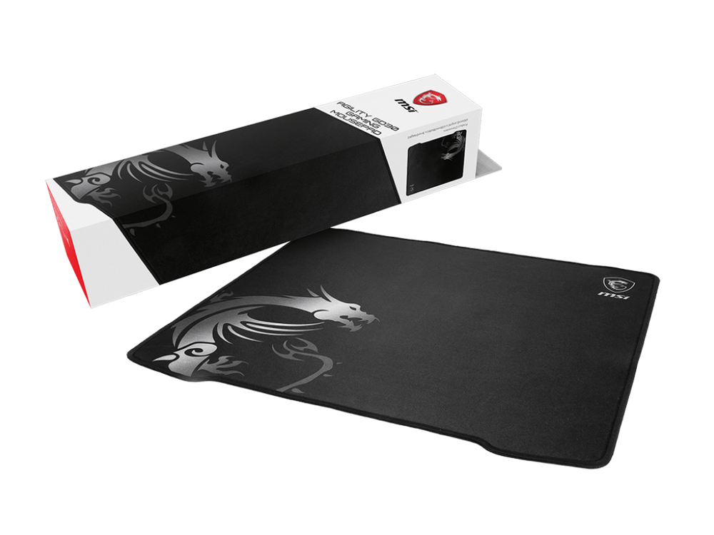Alfombrilla de ratón y caja MSI para juegos. Alfombrilla negra con diseño de dragón blanco. La caja es blanca y negra.