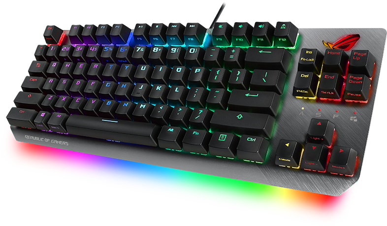 RGB-világítású gamer billentyűzet színes gombokkal és piros ROG logóval a szürke felületen.