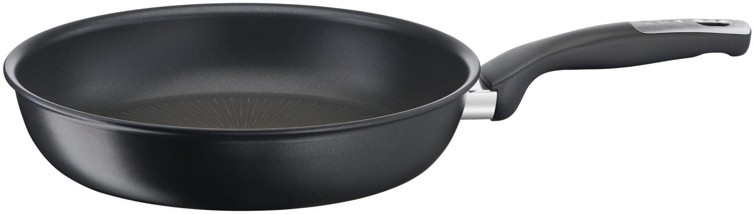 Black frying pan with a long handle, seen from above, on white background.