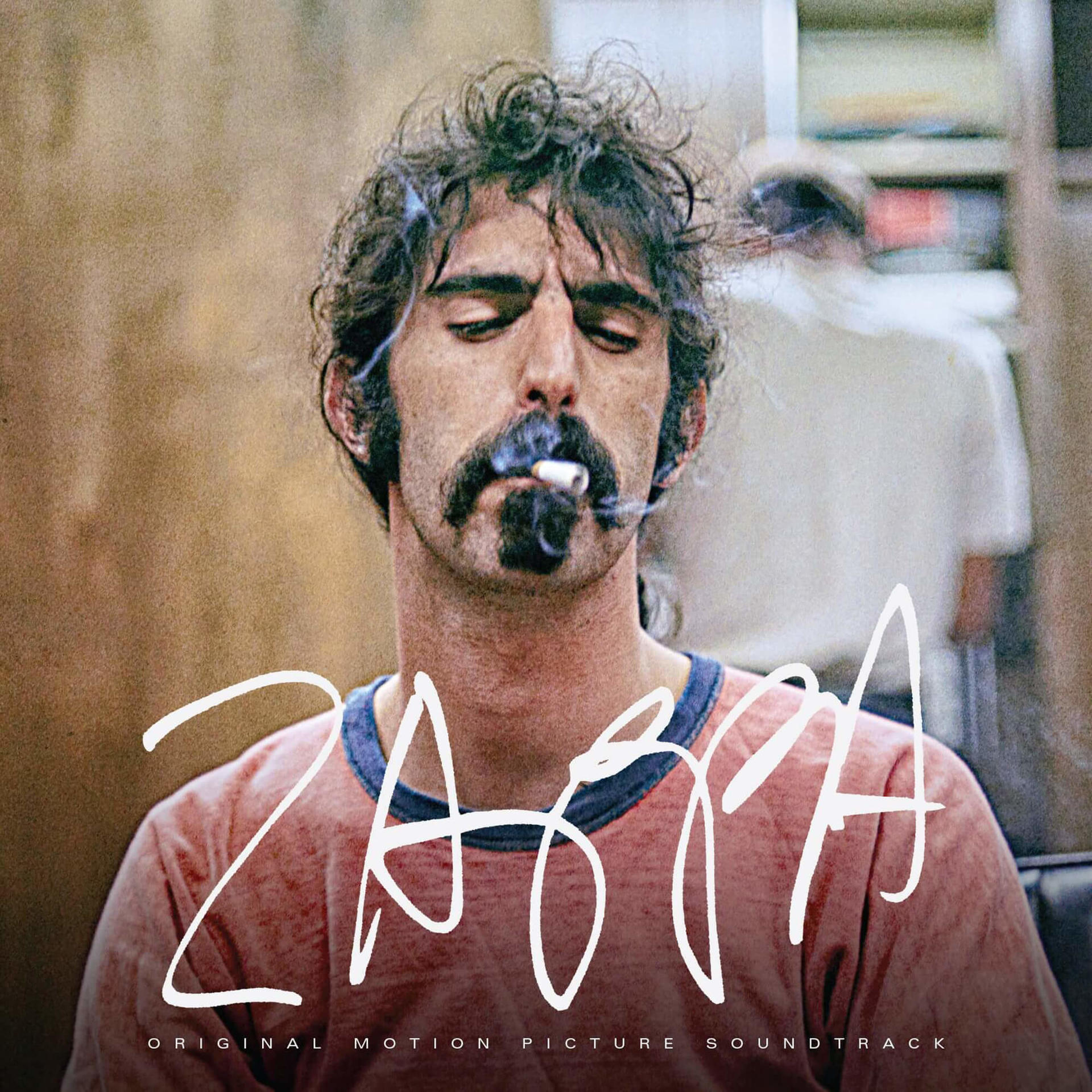Frank Zappa rookt een sigaret. De albumhoes heeft het woord "ZAPPA" erop.