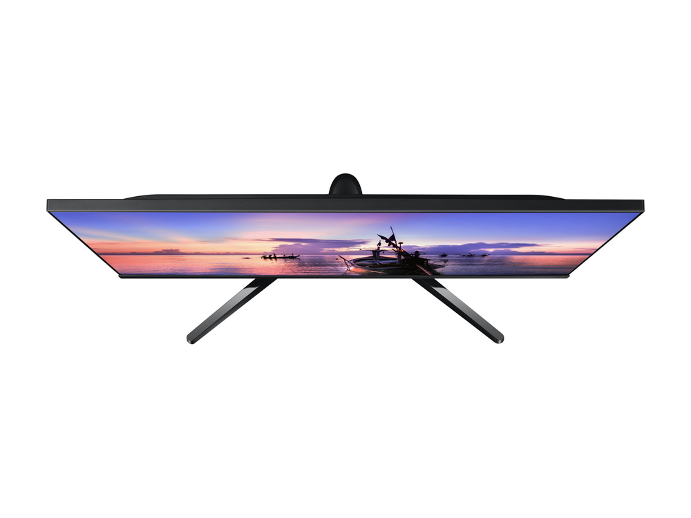 Vista superior de un monitor de ordenador. La pantalla muestra una escena de atardecer.