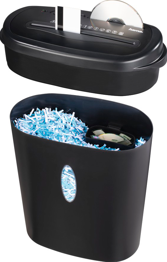 Déchiqueteuse de papier noire avec un bac. Papier déchiqueté et un CD visibles.