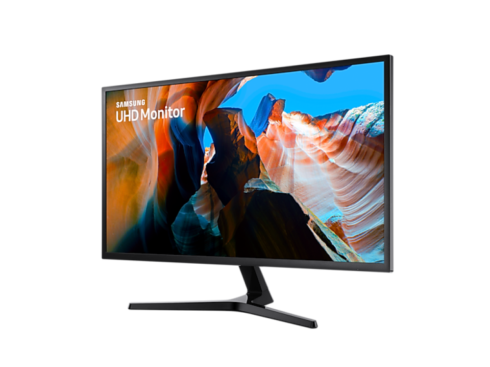 Monitor negro con una imagen escénica de paredes de cañón. Soporte negro. Fondo negro.