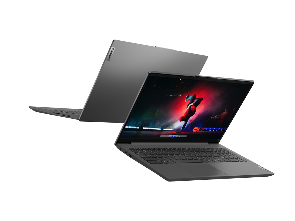 Dos portátiles Lenovo grises, uno abierto, sobre superficie blanca.