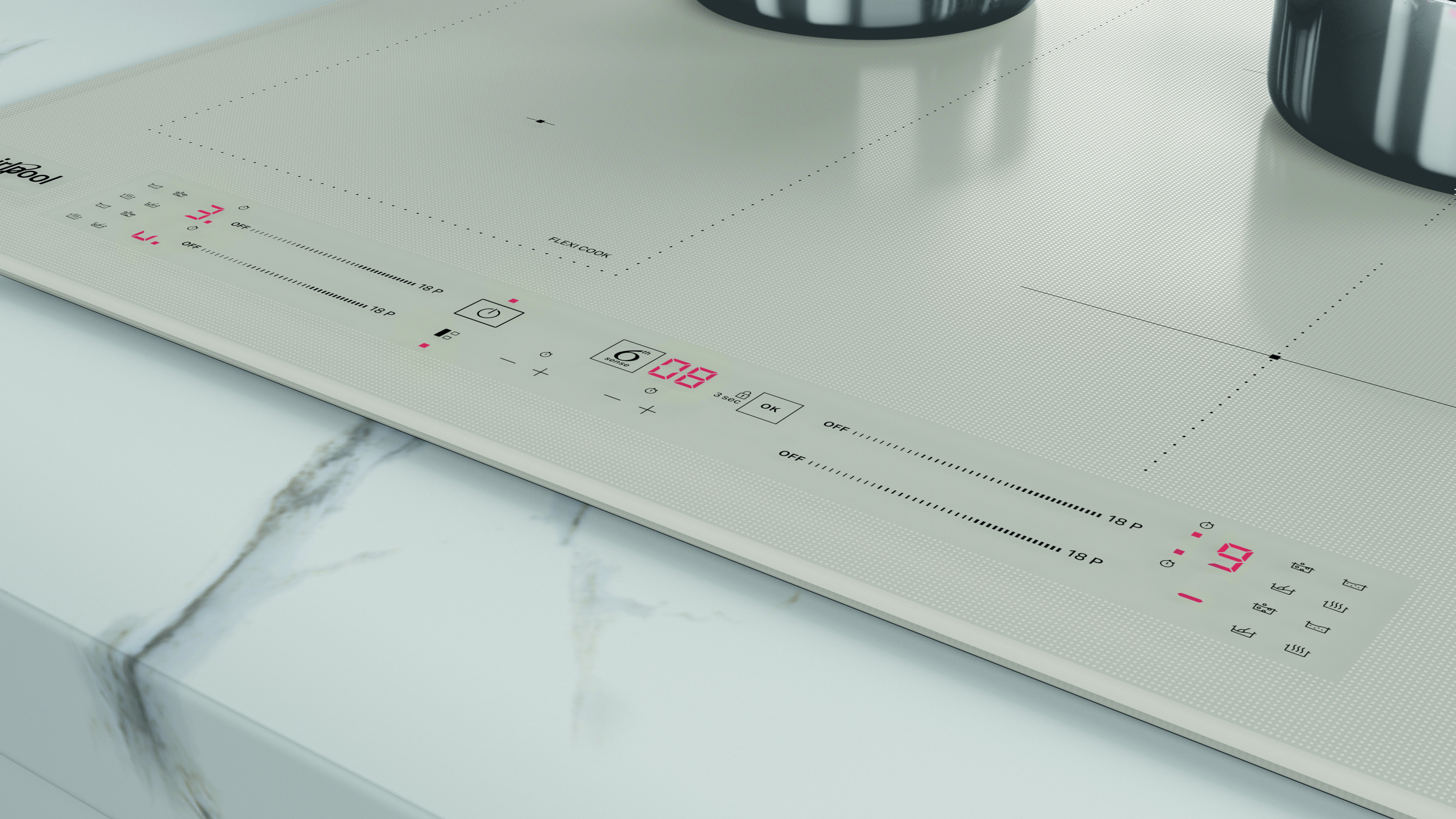 Közelkép egy főzőlapról digitális vezérléssel. Fehér, piros és fekete számokkal.