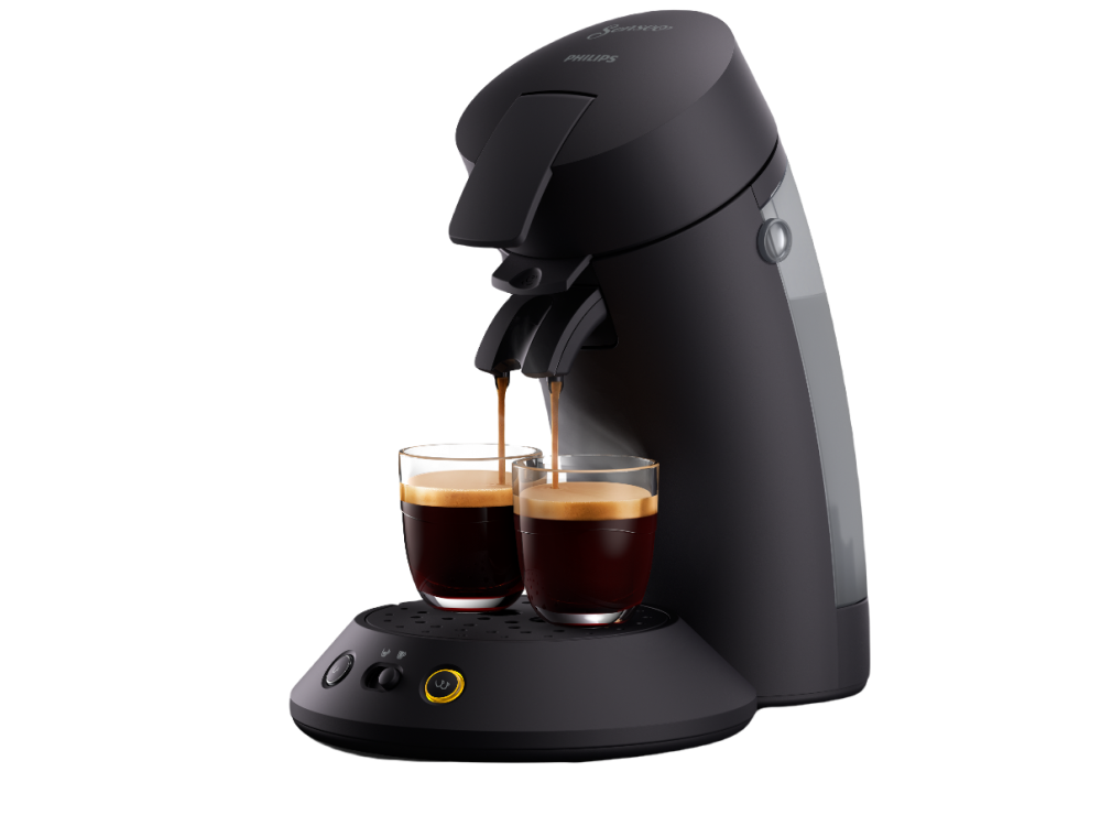 Cafetera Philips Senseo negra con dos vasos de café sirviéndose.