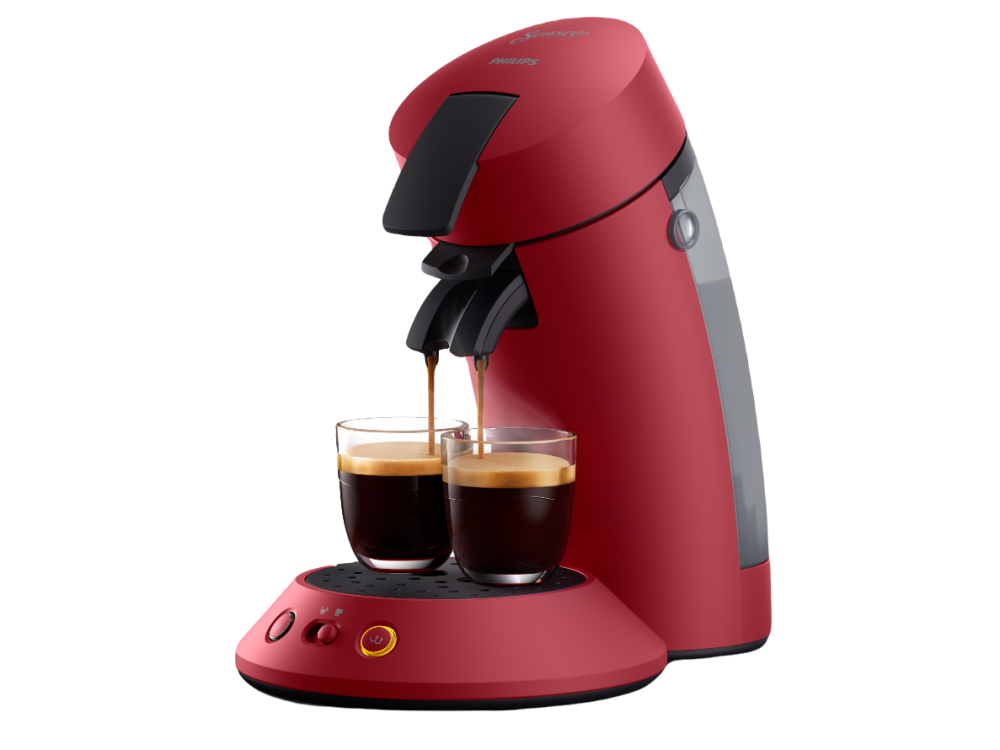 Una cafetera Philips Senseo roja dispensando café en dos vasos transparentes.