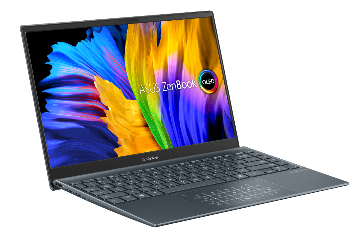 Una computadora portátil, abierta, con una pantalla colorida. Es de color gris oscuro con teclado y panel táctil.