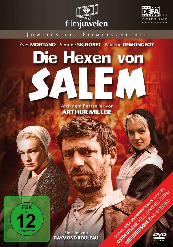 DVD-Cover von 'Die Hexen von Salem'. Drei Personen, ein Mann in der Mitte, der Rest an den Seiten. Roter Hintergrund.
