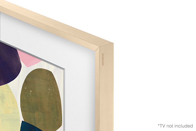 Soyut sanatla altın renginde bir Samsung Frame TV çerçevesinin yakın çekimi. Küçük bir 'Samsung' logosu görünür.