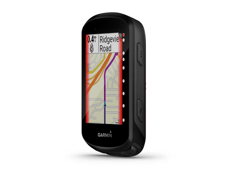 Ordenador para ciclismo Garmin. Negro, mostrando un mapa y datos. Botones y una pantalla pequeña.
