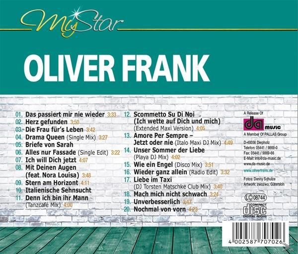 Rückseite einer CD von Oliver Frank mit Trackliste. Der Hintergrund ist eine Backsteinmauer.