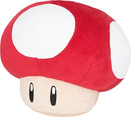 Un jouet champignon en peluche, rouge avec des pois blancs et une tige beige.