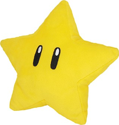 Cuscino giallo a forma di stella con occhi e bocca neri.