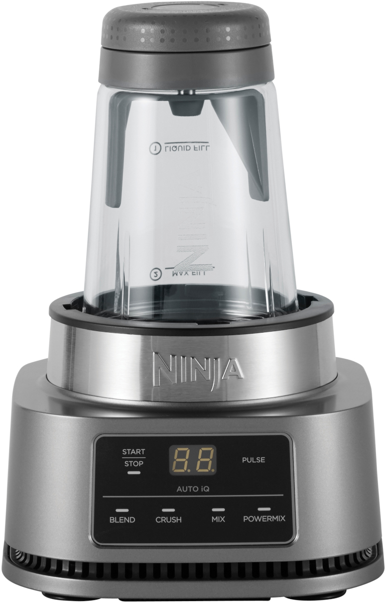 A Ninja blender with a digital display. The blender is silver, with a clear container on top.
