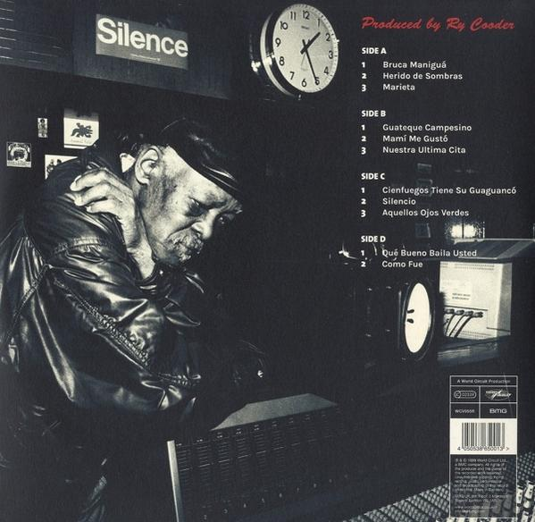 Egy album borítója, rajta egy lefelé néző férfival. Egy óra látható. A szöveg tartalmazza a 'Silence' és a dalcímeket.
